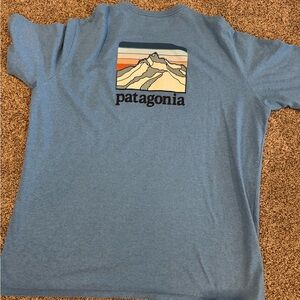 Patagonia Blue Tee with Mountain Design